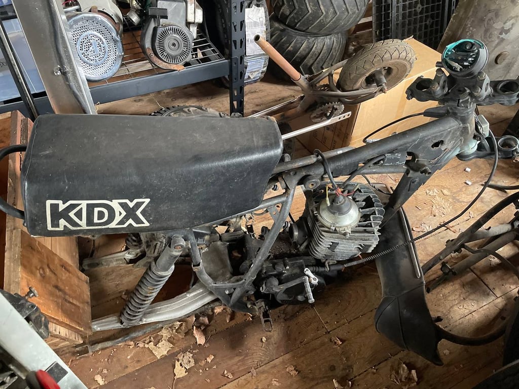 1979 Kawasaki KDX400-A1, before restoration: partly stripped frame with the KDX seat