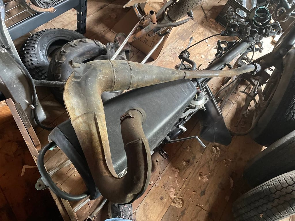 1979 Kawasaki KDX400-A1, before restoration: exhaust and frame parts