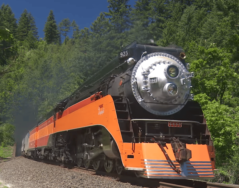 AI render of an orange and black steam locomotive, used as color inspiration, for the 1989 Honda Gold Wing GL1500 Aspencade build