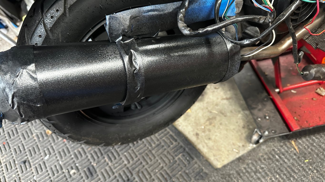 Tao Tao 50cc moped: close-up of the exhaust muffler