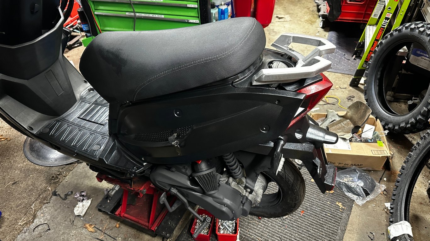 Tao Tao 50cc moped: side view in the shop