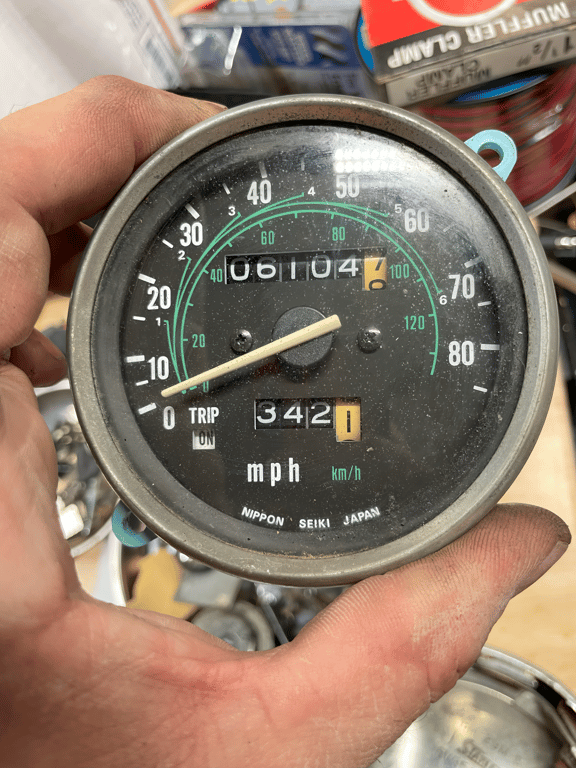 1979 Honda XL125s, restoration in progress: speedometer held in hand