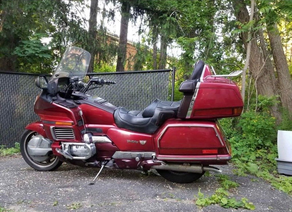 1995 red Honda Gold Wing GL1500 Interstate: side view outdoors
