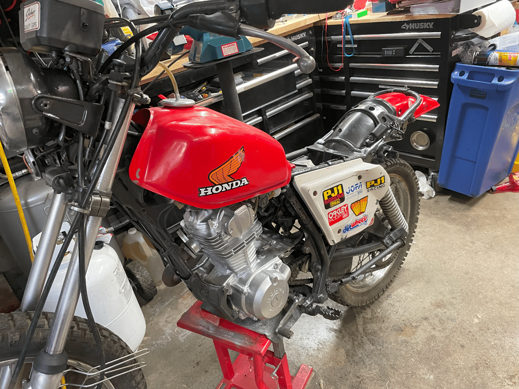 1979 Honda XL125s, restored: red Honda fuel tank