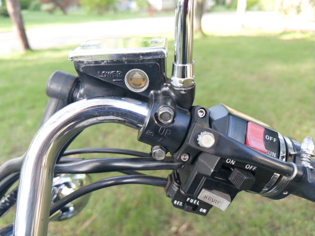 1995 Yamaha Virago 1100, completed restoration: handlebar controls, photographed outdoors