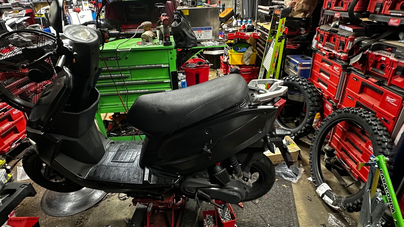 Tao Tao 50cc moped: side view in the shop