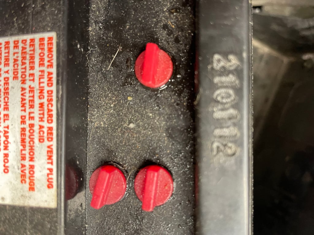 1995 red Honda Gold Wing GL1500 Interstate, during the restoration: labels and red caps