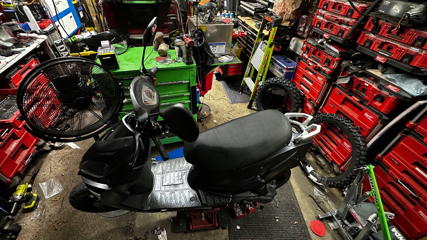 Tao Tao 50cc moped: side view on the shop floor