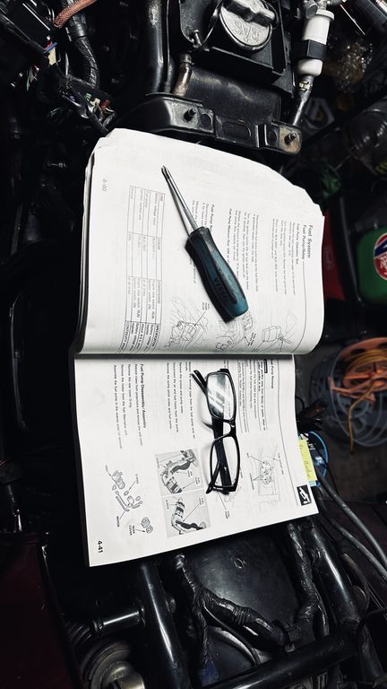 1988 Honda Gold Wing GL1500 Aspencade Kindle: service manual page and screwdriver on the workbench