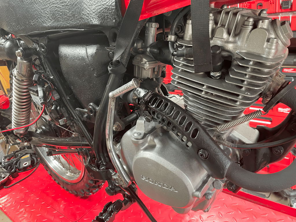 1979 Honda XL125s, during the rebuild: engine on the lift