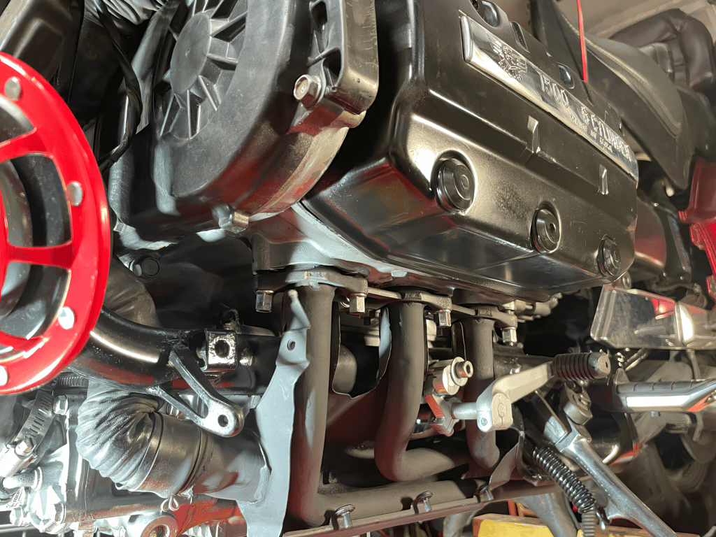 1995 red Honda Gold Wing GL1500 Interstate: engine area on the lift