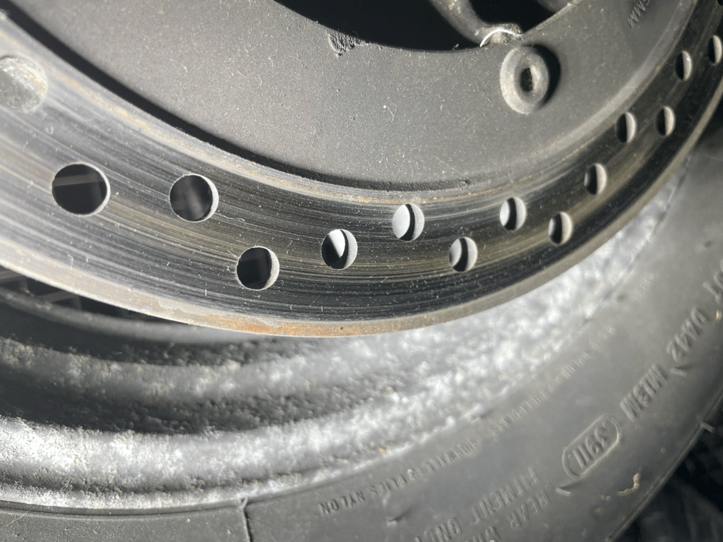 1995 red Honda Gold Wing GL1500 Interstate, during the restoration: brake rotor and tire