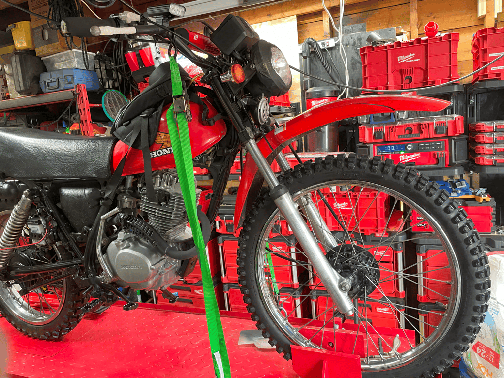 1979 Honda XL125s, during the rebuild: full side view on the lift