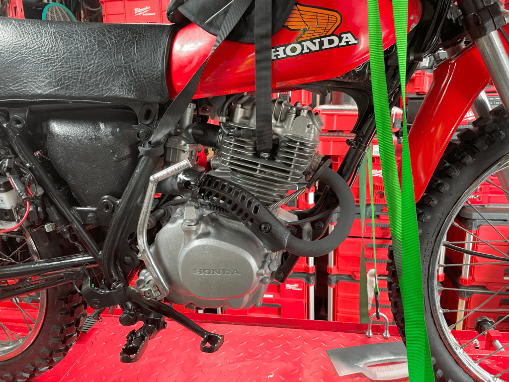 1979 Honda XL125s, during the rebuild: engine on the lift