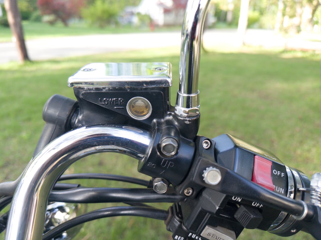 1995 Yamaha Virago 1100, completed restoration: handlebar controls, photographed outdoors